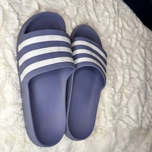 Purple ADIDAS slides. Size 8, good condition.